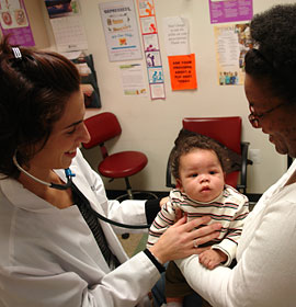 A nurse practitioner at the 11th Street Family Health Services of Drexel University provides primary care to members of the underserved North Philadelphia community.